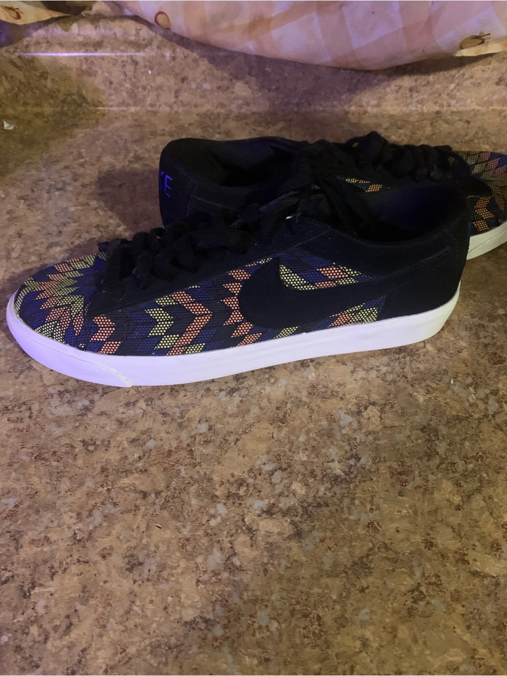 Nike Black Low-Top Sneaker with Multicolor Chevron Accents